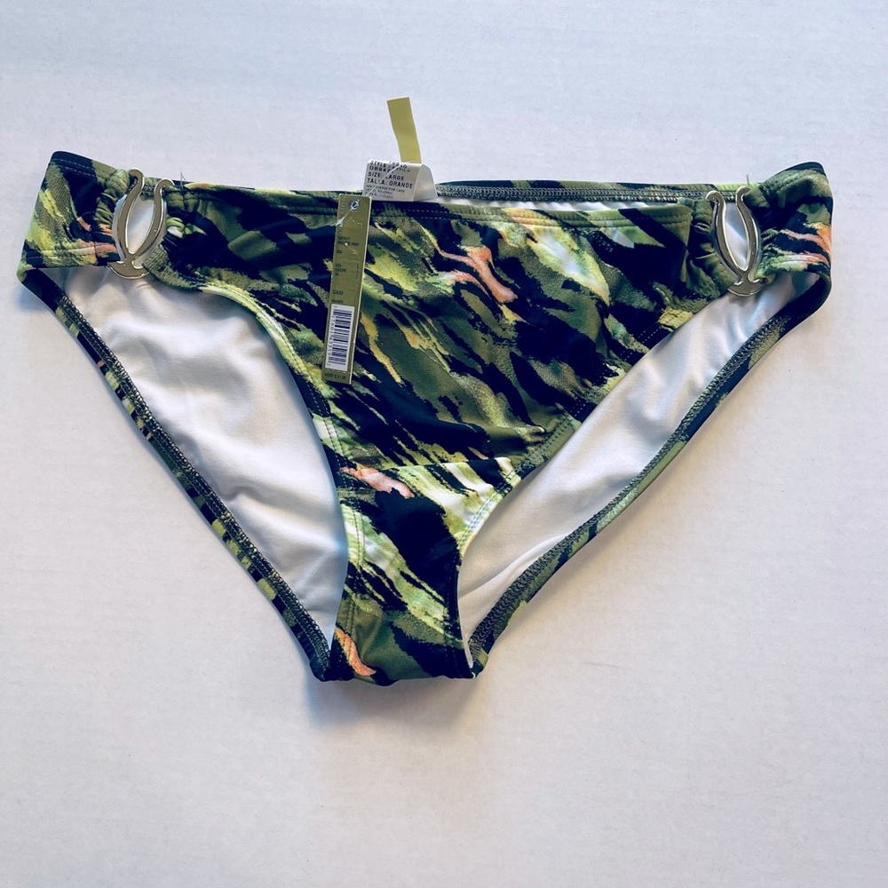 Gianni Bini large swim suit. NWT and hygienic panty liner. Never worn.